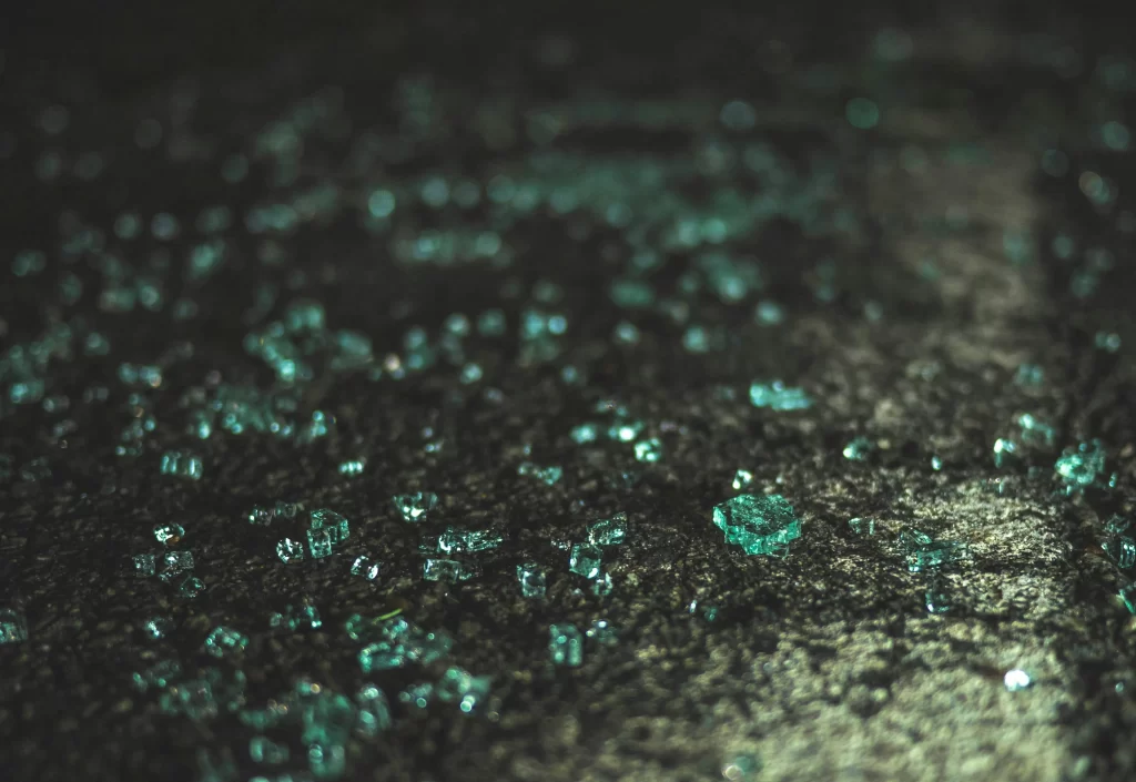 Glass From a Broken Car Window on Tarmac